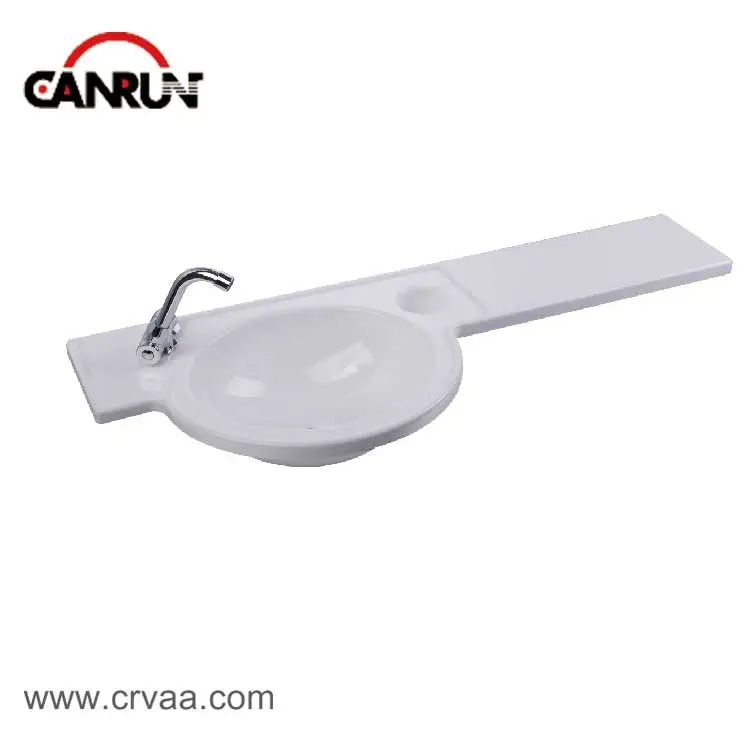 Lavabo ovalado de acrílico con encimera integrada